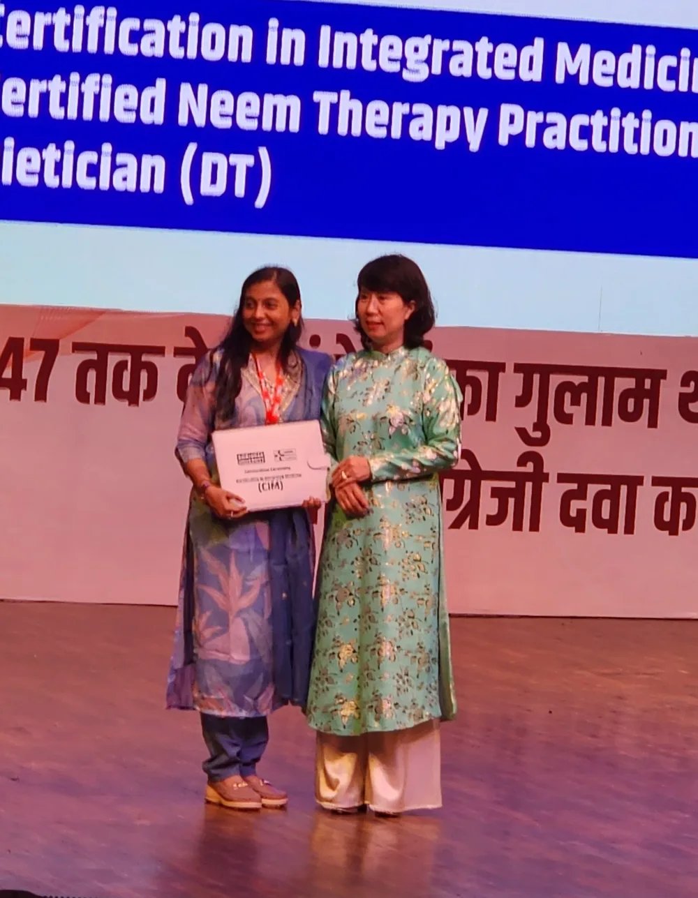 Dr. Arpitta Sephalli felicitated on stage for excellence in naturopathy